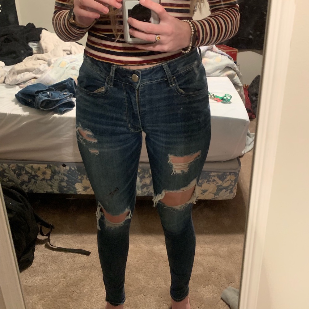 Distressed medium jeans